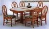 Floral tile top table with round back cushioned chairs